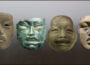 Various ornamental masks from 1000 BCE to 300 BCE.