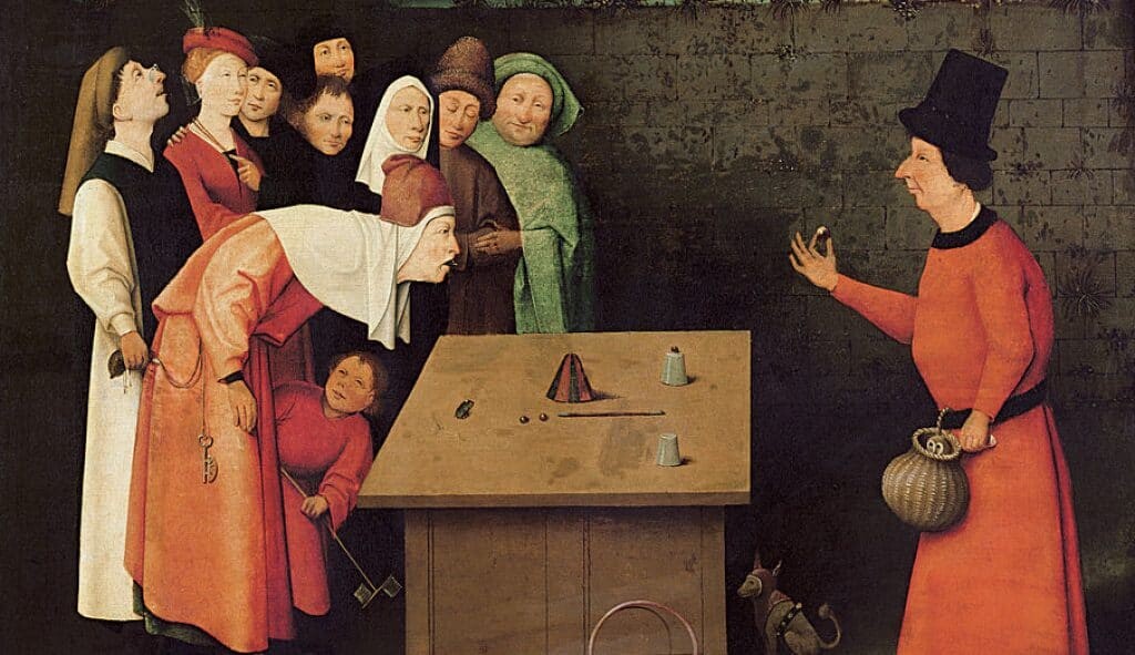 Een goochelaar voert een glastruc uit terwijl een man de geldzak van een toeschouwer steelt, c. 1475, De goochelaar van Hieronymus Bosch.