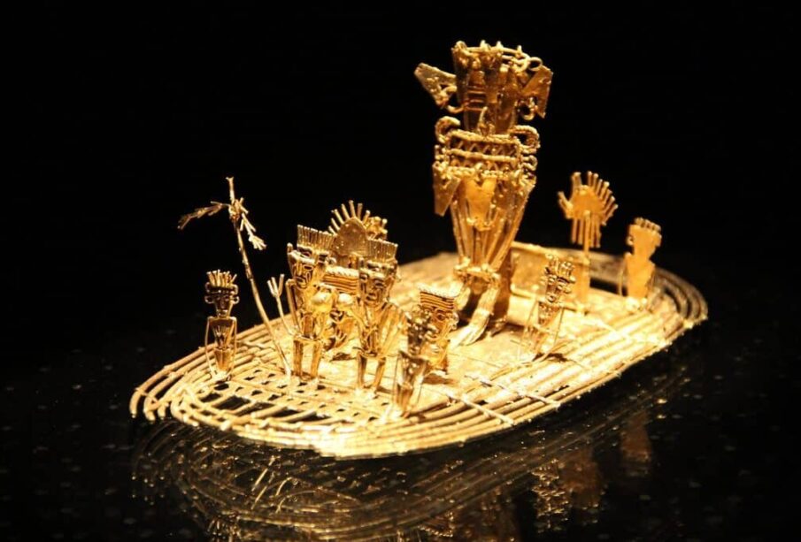 Representation of the “Gilded One” covering his body in gold dust and offering treasures to the goddess in Lake Guatavita. Was this the origin of the legend of El Dorado?